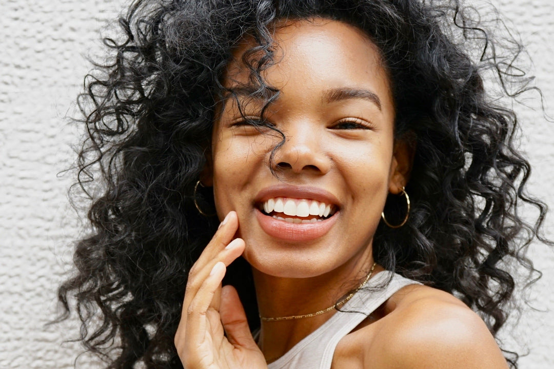 Woman smiling with clear skin 